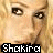 Pixelated close-up of a person's face with blonde hair, showing two side-by-side views where the right eye has a white dot in one view and not the other.