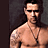 A pixelated image of a shirtless man with tattoos and a dog tag necklace, surrounded by text reading "no one beats this hottie" on black background.