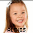 A young girl with long brown hair and a white headband smiles broadly, wearing a light pink top against a plain white background.