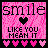 Pixelated pink background with black text 'smile' and 'LIKE YOU MEAN IT', a central heart symbol, and of small hearts below