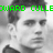 Black-and-white photo of a man with short dark hair, wearing a collared shirt; green pixelated text overlays read "EDWARD CULLE" and "standard" at top, "boyfriends" in bottom-left.
