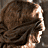 A pixelated animation of a man with brown hair in profile, transitioning from a side view to a front view while holding a cigarette, with 'WAR OF THE WORLDS' text in the corner.