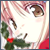 Pixelated anime-style icon showing a character's face with brown hair, green clothing, and a red bow, set against a pink and white background.