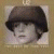 A split-frame contact sheet showing a pixelated portrait on the left and green text logo on the right against dark background.
