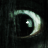 A pixelated crescent moon shape with a small white dot inside, set against a dark background.