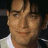 A 48x48 pixel animated contact sheet showing two frames of a buddy icon featuring a person's face on the left and "MOULIN ROUGE!" text on the right.