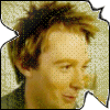 identical cartoon-style headshots showing a person with light brown tousled hair, neutral expression, and dark clothing against a light patterned background