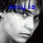 Pixelated grayscale image of a person's face with blue text overlay reading "sexy is staring at" across the top.