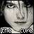 A 4x4 contact sheet of animated frames showing a grayscale close-up of a person's face with the text [the cure] below each frame, arranged left-to-right and top-to-bottom on a gray background.