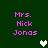 Green background with pink text reading "Mrs. Nick Jonas" and two pixelated hearts, one white and one gray, in different positions across frames.