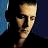Pixelated image of a person's face next to white text on dark background in contact sheet format with two frames.
