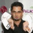 A pixelated image shows a person in a black sleeveless shirt holding a white object with red accents, set against a light background.