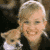 pixelated images shows a woman with blonde hair holding a small dog, transitioning to her alone in different settings