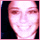 A pixelated image of a person with dark hair and a light-colored top, showing facial expressions and text characters in a