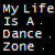 Pixelated text reads "My Life Is A Dance Zone" in four lines on a black background with multicolored lettering.