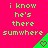 A static image with bright pink background and green pixelated text repeating 'i know he's there sumwhere' across two , each containing three identical text blocks with a green triangular shape featuring a heart symbol