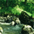 Pixelated green and black scene with light green foliage, dark rock formations, and a reflective water surface.
