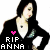 Pixelated image of a person with dark hair wearing black clothing and a necklace, standing against white background with pink heart symbol above text "RIP ANNA".
