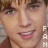 A 3x3 contact sheet of eight animated frames showing a young man with light brown hair and green eyes in various facial expressions, each frame featuring vertical "FAN" text on the right side.