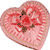 A pixelated heart-shaped icon with pink and red tones, featuring brown accents and a small black dot on the left side.