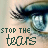 A pixelated close-up of a person's eye with long eyelashes and blue eyeshadow, overlaid with text reading "STOP THE TEARS" in dark green block letters.