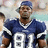 Pixelated image of a football player in blue jersey with number 81, next to green displaying text and dotted lines