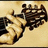 Pixelated image of a hand holding a bouquet of flowers with text reading "LUV" and "Robbie!!!" on a black background.