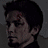 A pixelated animation of a man's face transitioning from left to right with red text reading PLANET TERROR below.