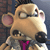 Pixelated cartoon mouse character with large ears, brown fur, and a purple tie against dark background.