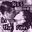Pixelated image of a person with dark hair and light skin, text overlay reading 'kiss me in the rain' in stylized font.