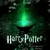 Green glowing object with 'Harry Potter' text on dark background, accompanied by pixelated text about WB decisions and money.