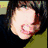 Animated sequence showing a person's face with changing expressions and text overlays including 'Hugs Not Drugs' and 'Peace On Earth'.