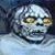 Static pixelated image of a stylized skull with glowing eyes against a dark background, rendered in low-resolution 256x256 pixels.