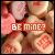 heart-shaped candies with 'BE MINE?' text, showing animation where the text color shifts between white and orange across frames
