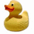 Pixelated yellow rubber duck with orange beak and black eye, positioned left of text reading 'we squack it for free' on white background.