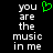 Pixelated text reads 'you are the music in me' with a green heart symbol replacing the word 'love', displayed on black background.