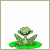 Pixelated green creature with wide grin on white background, shown in two poses: seated and standing.
