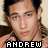 A pixelated image of a person with dark hair and light skin, wearing a patterned shirt, with the name 'ANDREW' displayed in white block letters on a black background at the bottom.