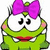 Green cartoon character with pink cheeks, white eyes, red mouth, and purple bow, next to text reading Lucy V Frogs Frogs Win!