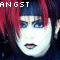 A static image of a person with red and black hair, white face makeup, dark lipstick, and visible teeth, with text overlays reading ANGST AND PRETTY DRESSES.