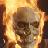 Pixelated static icon showing a stylized skull with glowing orange and yellow flames surrounding it against dark background.