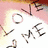 A pixelated white heart shape with 'LOVE ME' text, pink and yellow gradient background, and a small pink '3' symbol in the bottom right corner.