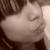 A sepia-toned animated sequence showing a person's face in profile with subtle facial movements
