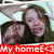 Two people in a photo frame with a red banner reading 'My homeE<3' across the bottom, showing slight variations in facial expressions and head positions.