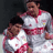 Static 48x48 pixel icon showing two figures in white and red sports uniforms against a dark background, rendered with heavy pixelation.