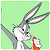 Pixelated cartoon rabbit with long ears holding a red object against light green background.
