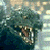 A pixelated image shows a creature with open mouth and sharp teeth on the left, next to green text reading "Original Icons .com" on a dark background.