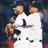 Pixelated image of two people in baseball uniforms embracing, with blue text reading "Living Proof: THE YANKEES ARE GAY!!!!!!!!" on a white background.