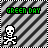 Green text 'GREEN DAY' above a white skull and crossbones on striped background with gray and black diagonal lines.