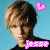 Pixelated image of a person with brown hair against light blue background, featuring pink heart symbol and 'jesse' text in pixel art style across two frames.